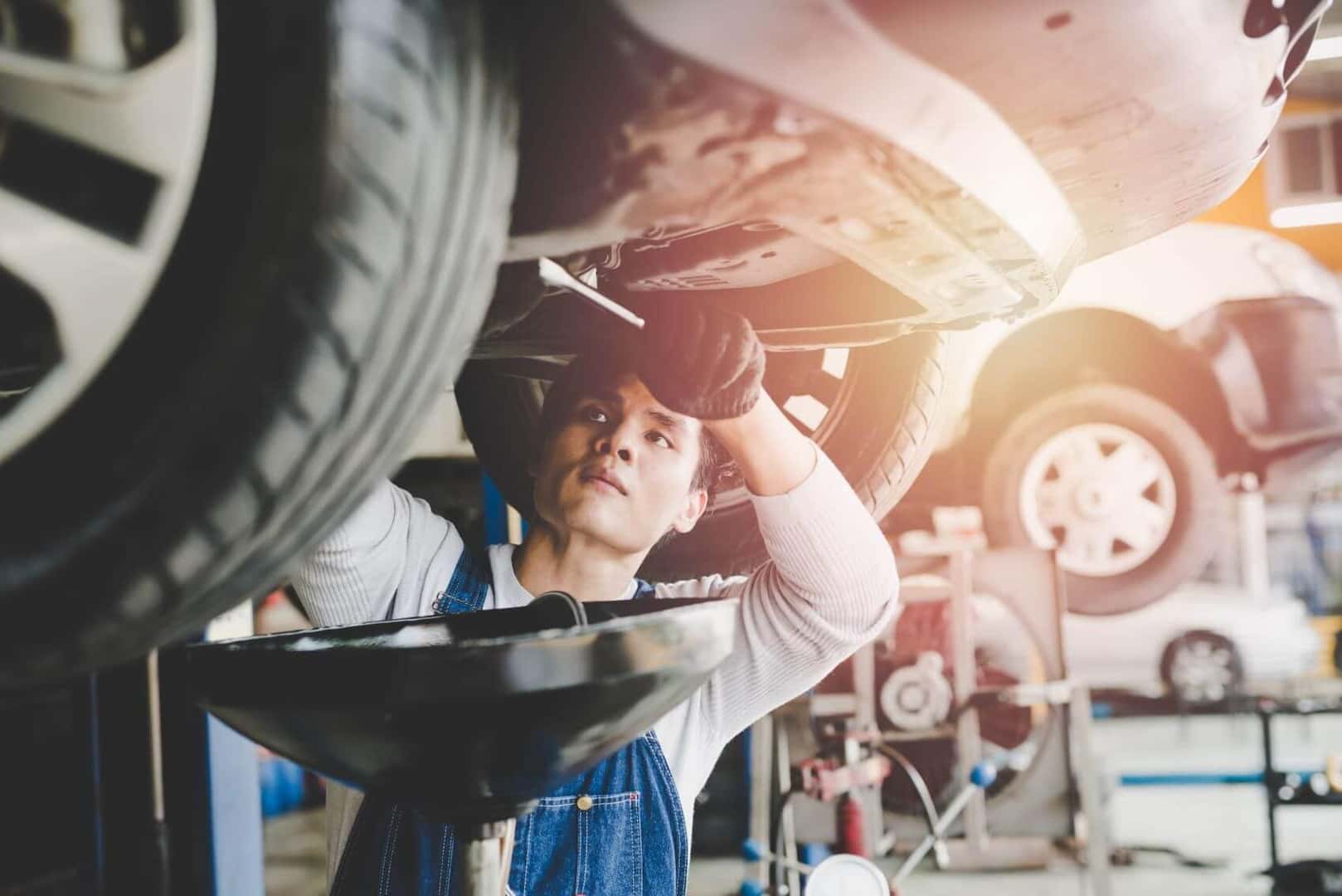 Technician working on brakes