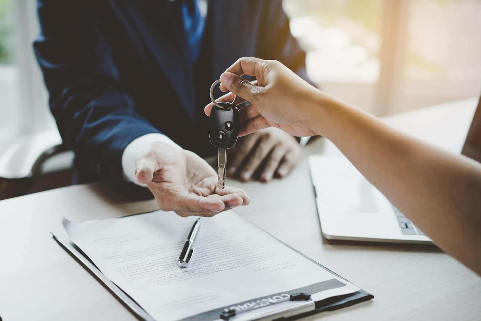 handing over the keys for a new car