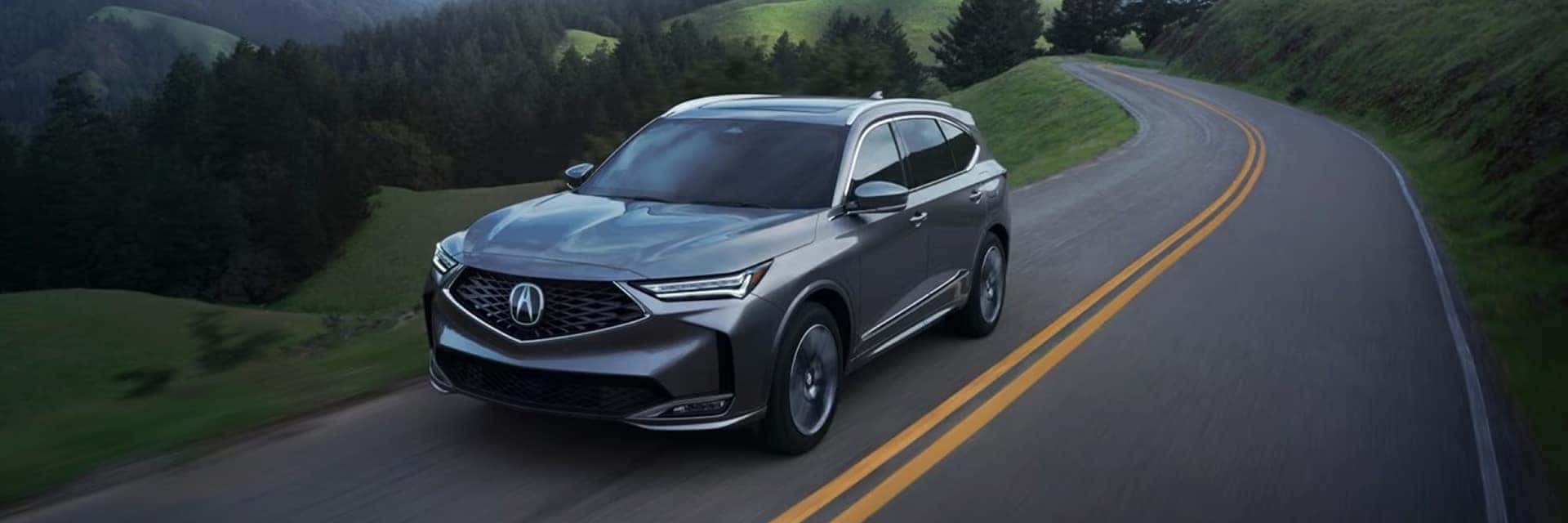 2026 Acura MDX driving on road