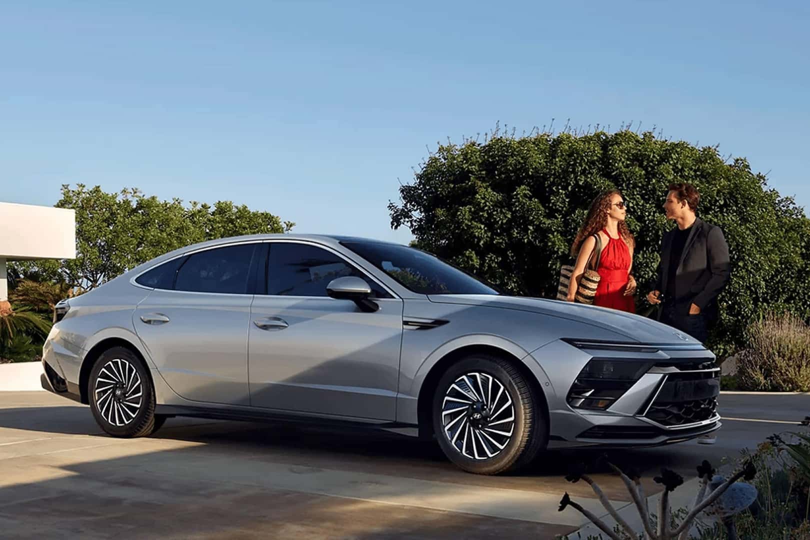 hyundai sonata parked in front of home